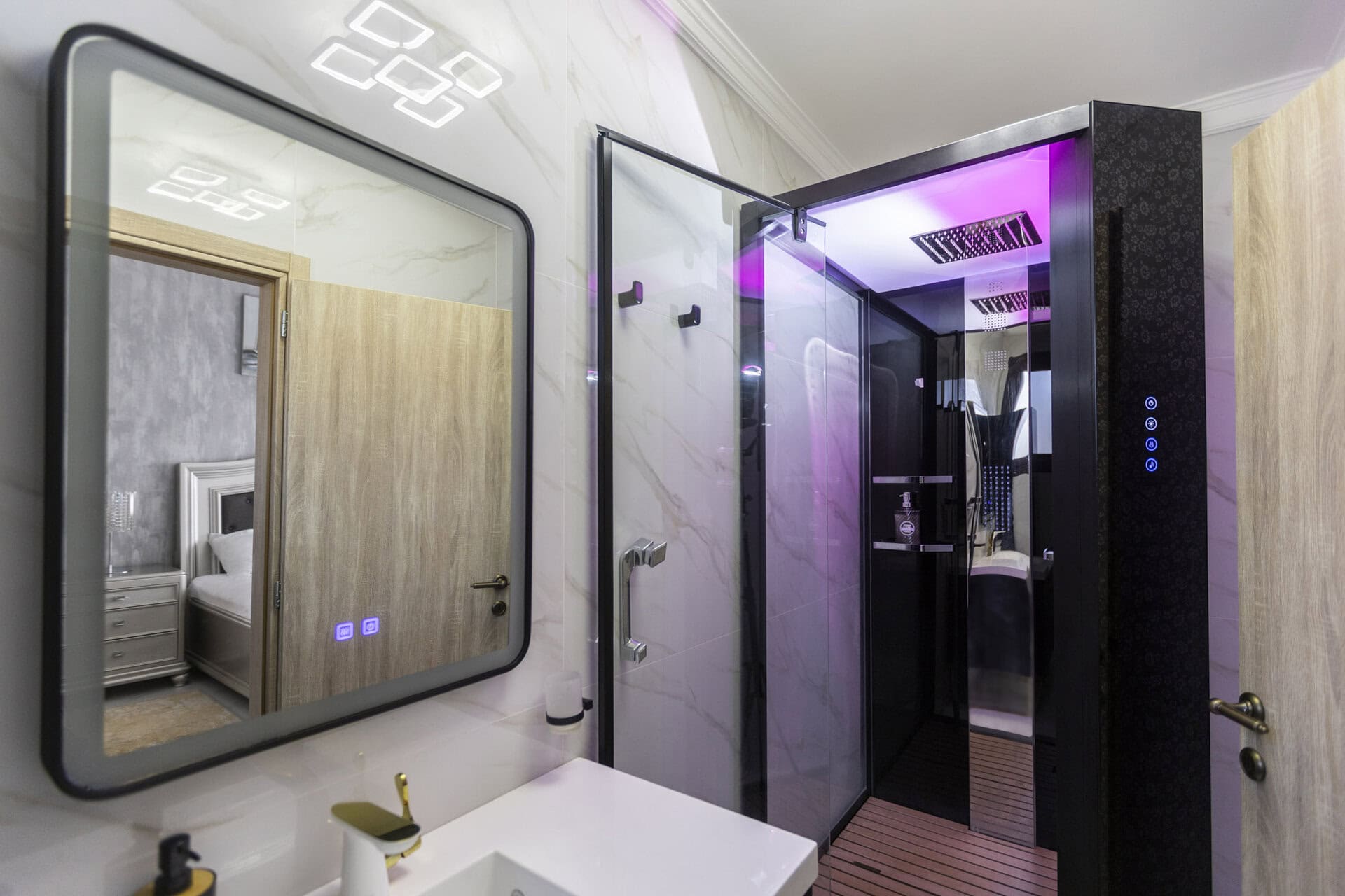 Modern bathroom with walk-in shower at Adonis Aegina Bungalows
