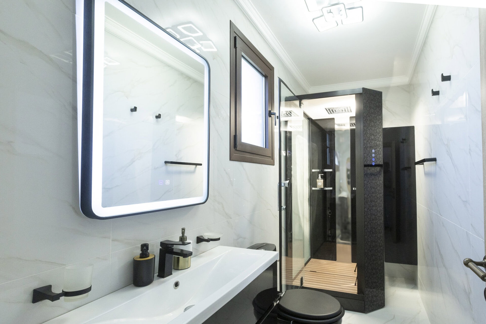 Modern bathroom with walk-in shower in Bungalow Apollo at Adonis Aegina Bungalows