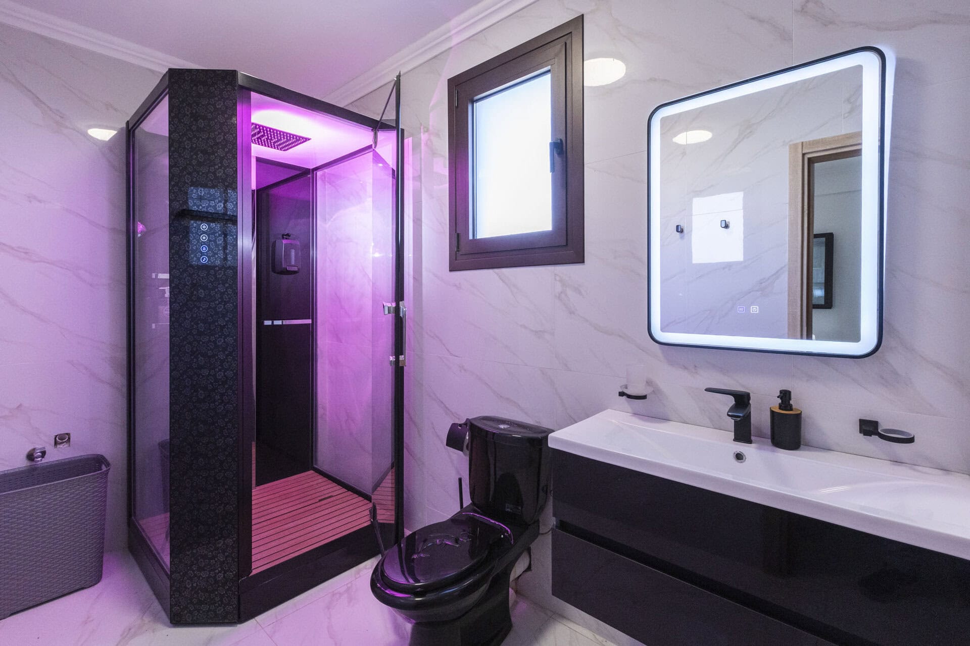 Modern bathroom with walk-in shower in Bungalow Athena at Adonis Aegina Bungalows