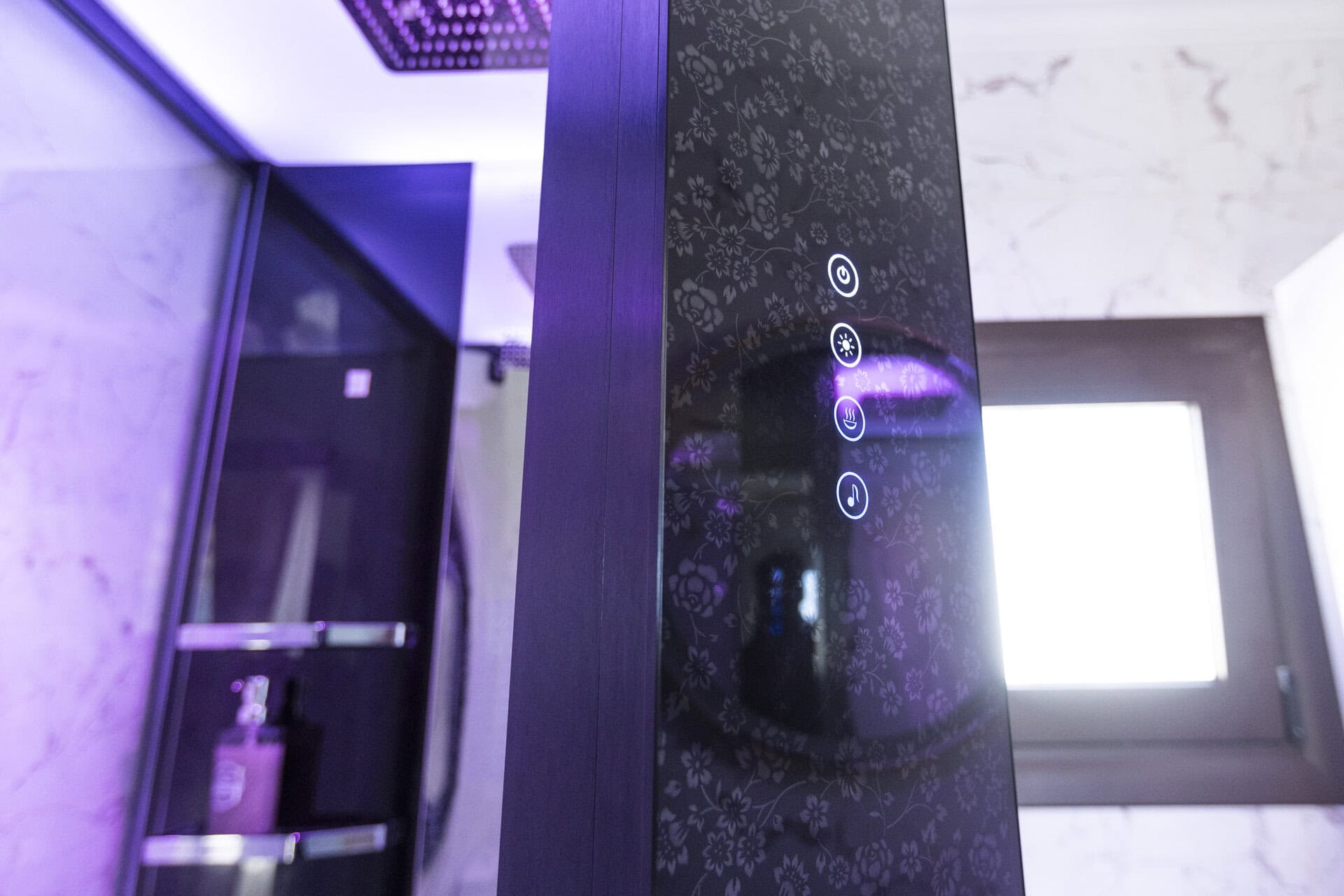 Glass shower with rainfall feature in the bathroom of Bungalow Hermes at Adonis Aegina Bungalows