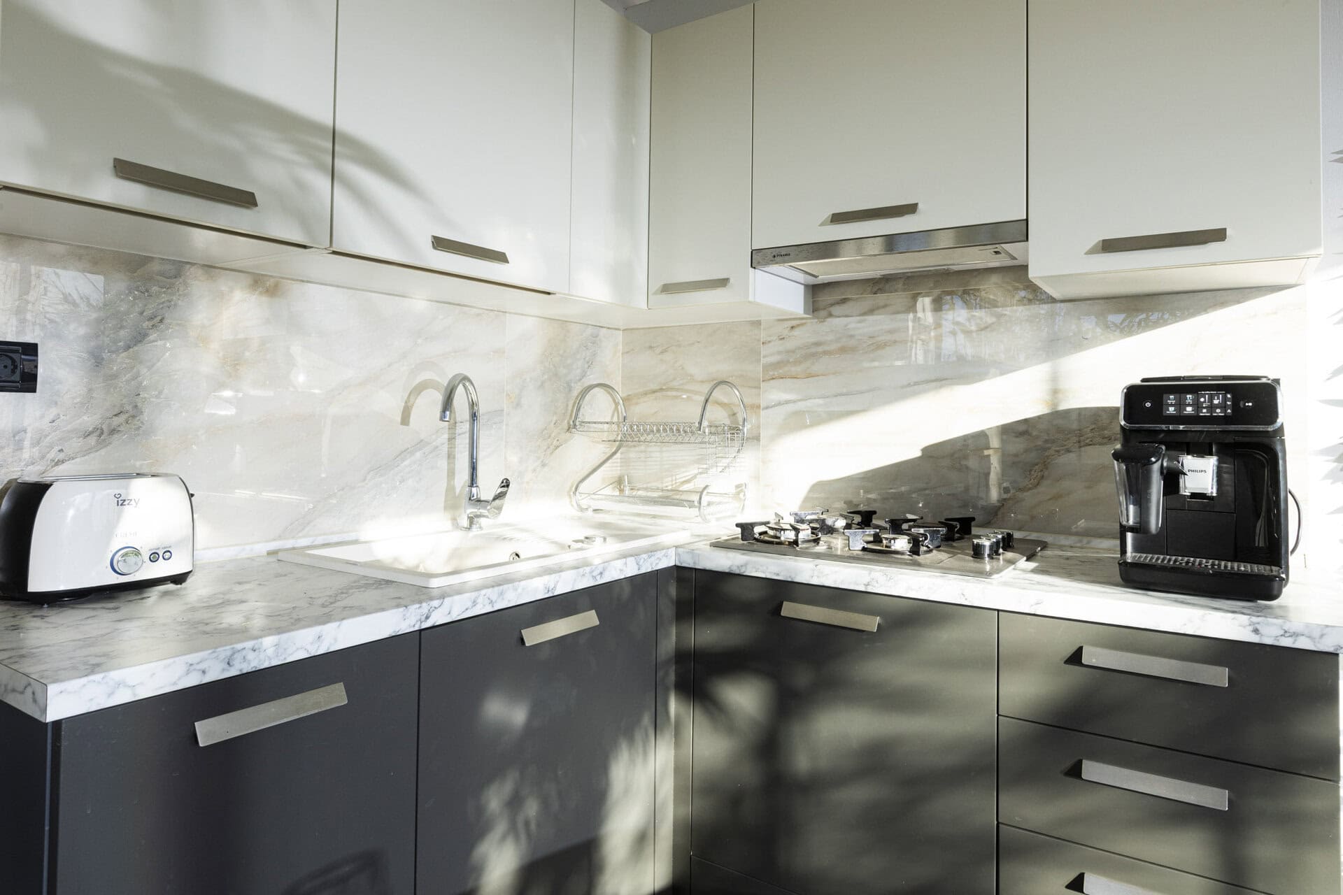 Fully equipped kitchenette with modern appliances at Adonis Aegina Bungalows